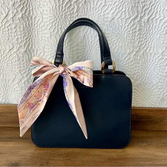 Liz Claiborne Handbags - Liz Claiborne Navy Leather Women’s Bag with brass hardware